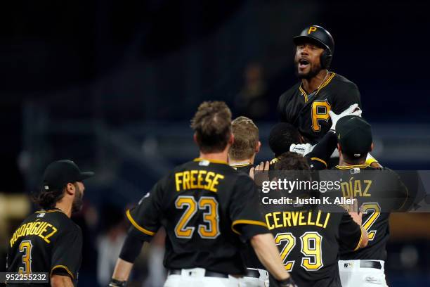 Starling Marte of the Pittsburgh Pirates celebrates after hitting a walk off single in the eleventh inning against the St. Louis Cardinals at PNC...
