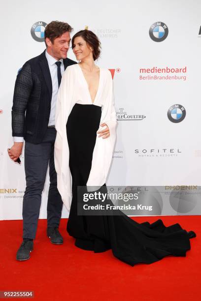 Ronald Zehrfeld and Christina Hecke attend the Lola - German Film Award red carpet at Messe Berlin on April 27, 2018 in Berlin, Germany.