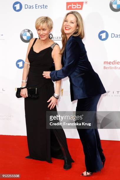 Gesine Cukrowski and Ann-Kathrin Kramer attend the Lola - German Film Award red carpet at Messe Berlin on April 27, 2018 in Berlin, Germany.
