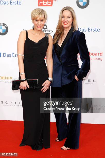 Gesine Cukrowski and Ann-Kathrin Kramer attend the Lola - German Film Award red carpet at Messe Berlin on April 27, 2018 in Berlin, Germany.