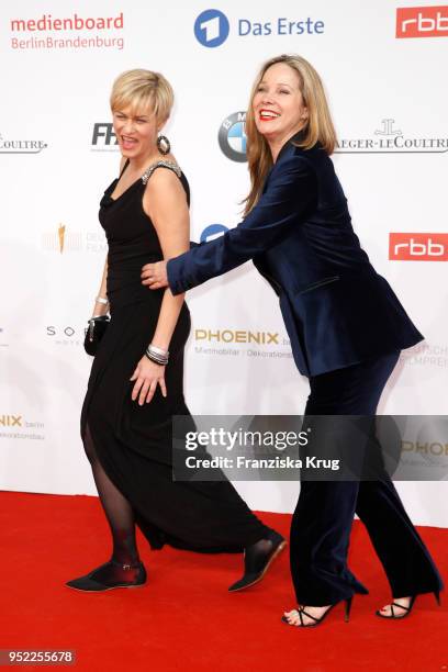 Gesine Cukrowski and Ann-Kathrin Kramer attend the Lola - German Film Award red carpet at Messe Berlin on April 27, 2018 in Berlin, Germany.