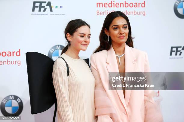 Lea van Acken and Nilam Farooq attend the Lola - German Film Award red carpet at Messe Berlin on April 27, 2018 in Berlin, Germany.