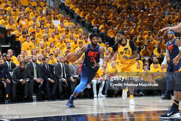 Paul George of the Oklahoma City Thunder handles the ball against the Utah Jazz in Game Six of the Western Conference Quarterfinals during the 2018...