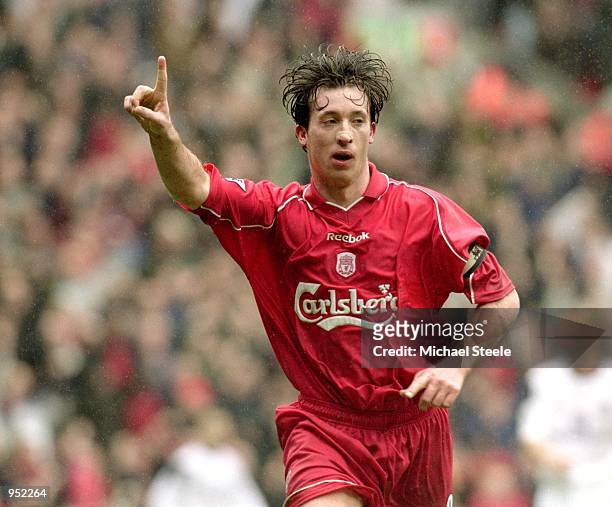 Robbie Fowler of Liverpool celebrates scoring the second goal during the FA Carling Premiership match against Manchester United played at Anfield, in...