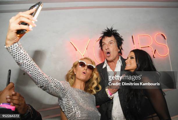 Paris Hilton, Tommy Lee and Brittany Furlan attend the 2018 Tribeca Film Festival World Premiere of Bert Marcus' THE AMERICAN MEME on April 27, 2018...
