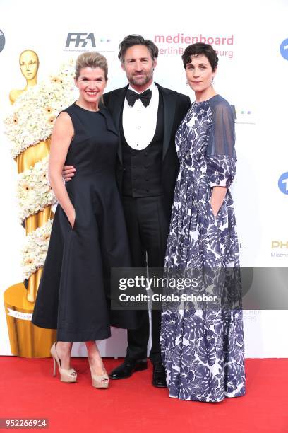 Anke Engelke, Benjamin Sadler and Nina Kunzendorf during the Lola - German Film Award red carpet at Messe Berlin on April 27, 2018 in Berlin, Germany.