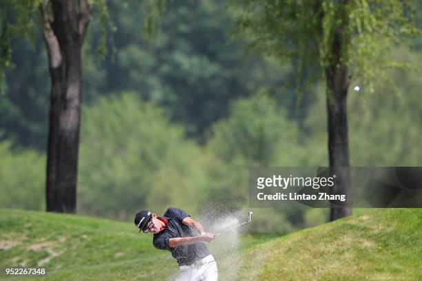 Micah Lauren Shin of the United States plays a shot during the day three of the 2018 Volvo China Open at Topwin Golf and Country Club on April 28,...
