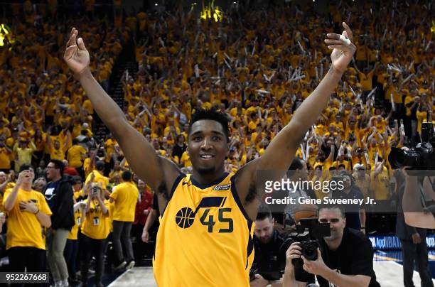 Donovan Mitchell of the Utah Jazz celebrates the Jazz win at the end of Game Six of Round One of the 2018 NBA Playoffs against the Oklahoma City...