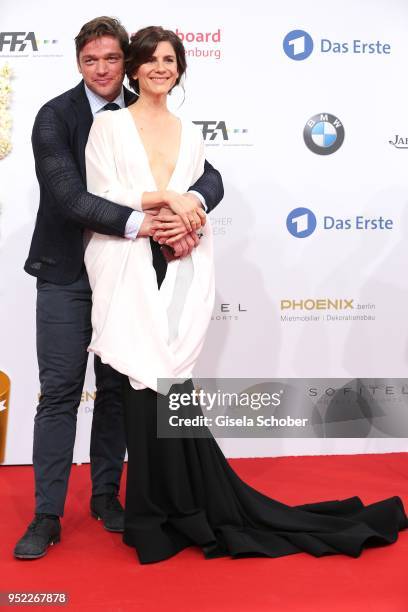 Ronald Zehrfeld and Christina Hecke during the Lola - German Film Award red carpet at Messe Berlin on April 27, 2018 in Berlin, Germany.