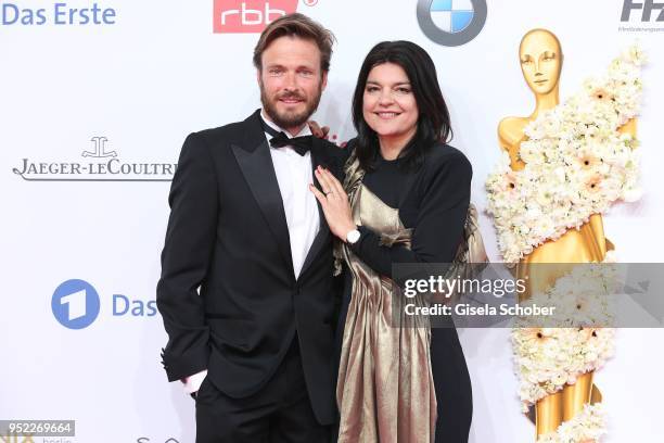 Jasmin Tabatabai and her husband Andreas Pietschmann during the Lola - German Film Award red carpet at Messe Berlin on April 27, 2018 in Berlin,...