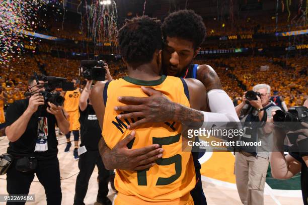Donovan Mitchell of the Utah Jazz and Paul George of the Oklahoma City Thunder hug after Game Six of the Western Conference Quarterfinals during the...