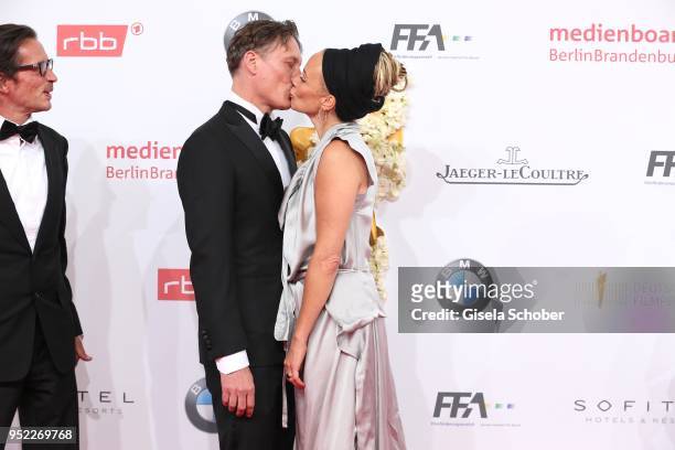 Oliver Masucci and Katja Riemann during the Lola - German Film Award red carpet at Messe Berlin on April 27, 2018 in Berlin, Germany.