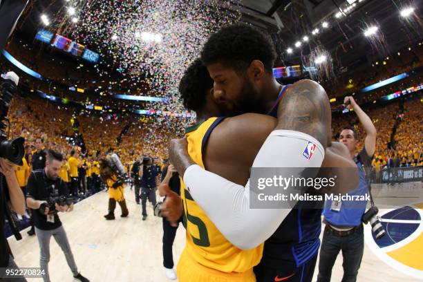 Donovan Mitchell of the Utah Jazz and Paul George of the Oklahoma City Thunder greet each other after Game Six of the Western Conference...