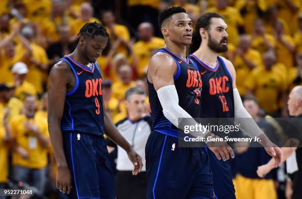 Jerami Grant , Russell Westbrook and Steven Adams of the Oklahoma City Thunder walk to the sidelines late in the second half during Game Six of Round...