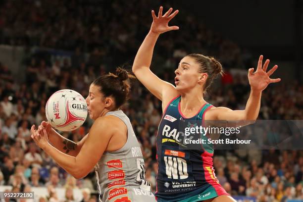 Madi Robinson of the Magpies and Chloe Watson of the Vixens compete for the ball during the Suncorp Super Netball round 1 match between the Melbourne...