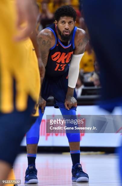 Paul George of the Oklahoma City Thunder looks on during Game Six of Round One of the 2018 NBA Playoffs against the Utah Jazz at Vivint Smart Home...