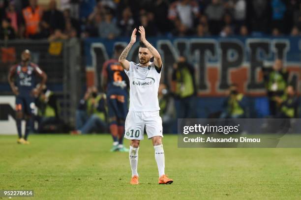 Remy Cabella of Saint Etienne Thanks Fans of Montpellier during the Ligue 1 match between Montpellier Herault SC and AS Saint-Etienne at Stade de la...