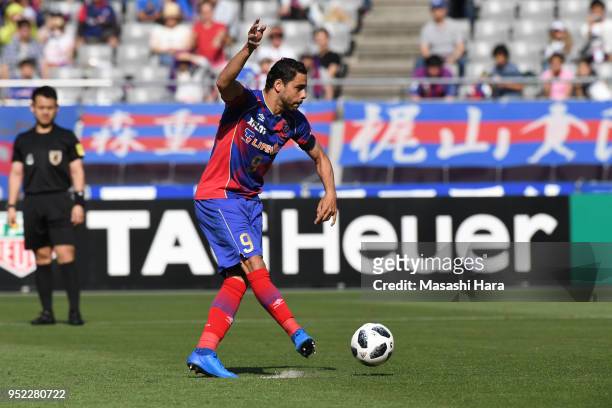 Diego Oliveira of FC Tokyo scores the first goal during the J.League J1 match between FC Tokyo and Nagoya Grampus at Ajinomoto Stadium on April 28,...