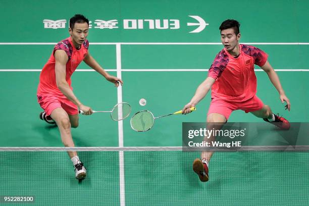 Liu Cheng and Zhang Nan of China hits a return during their man's doubles Semi final match against Takeshi Kamura and Keigo Sonoda of Japan at the...