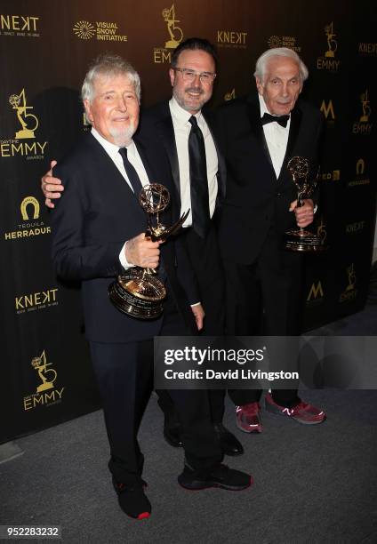 Producers Sid Krofft and Marty Krofft pose with actor David Arquette in the press room at the 45th Annual Daytime Creative Arts Emmy Awards at...