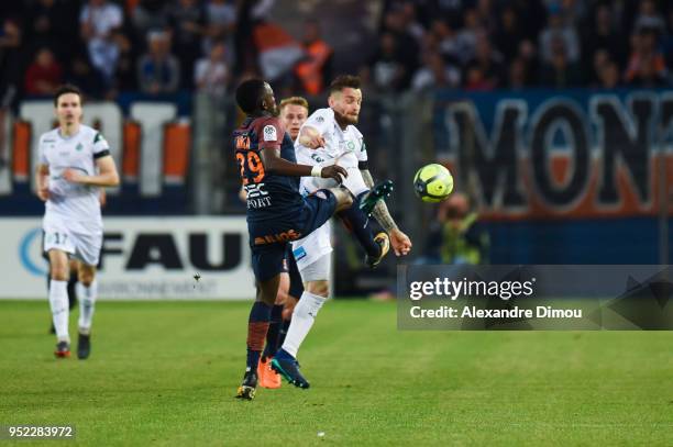 Casimir Ninga of Montpellier and Mathieu Debuchy of Saint Etienne during the Ligue 1 match between Montpellier Herault SC and AS Saint-Etienne at...