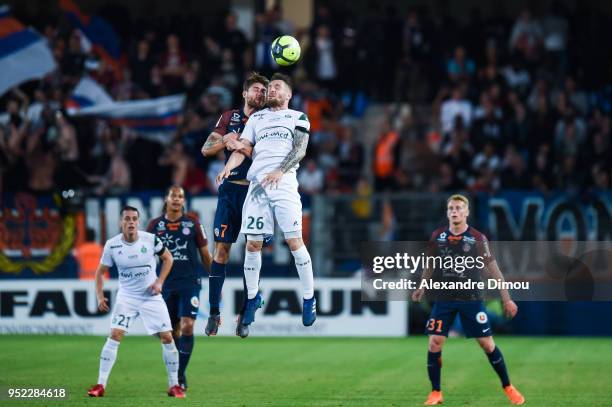 Mathieu Debuchy of Saint Etienne and Paul LAsne of Montpellier during the Ligue 1 match between Montpellier Herault SC and AS Saint-Etienne at Stade...