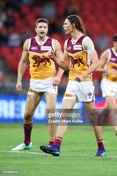 Eric Hipwood of the Lions celebrates kicking a goal during the round six AFL match between the Greater Western Sydney Giants and the Brisbane Lions...