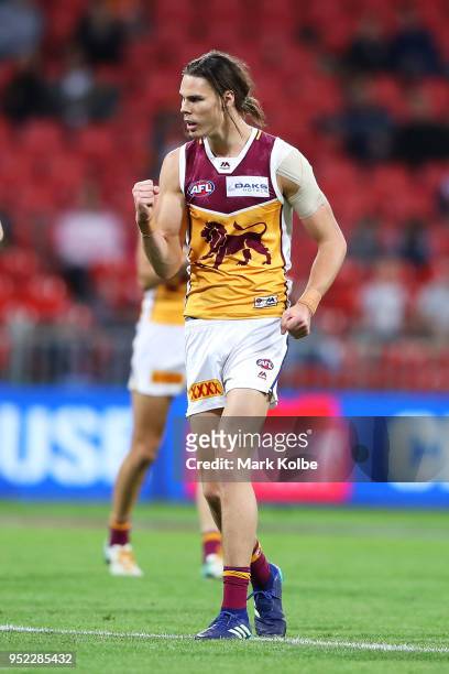 Eric Hipwood of the Lions celebrates kicking a goal during the round six AFL match between the Greater Western Sydney Giants and the Brisbane Lions...