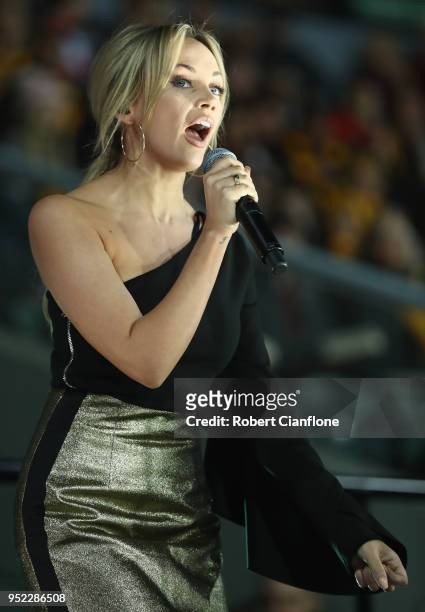 Samantha Jade performs prior to the Round six AFL match between the Hawthorn Hawks and the St Kilda Saints at University of Tasmania Stadium on April...