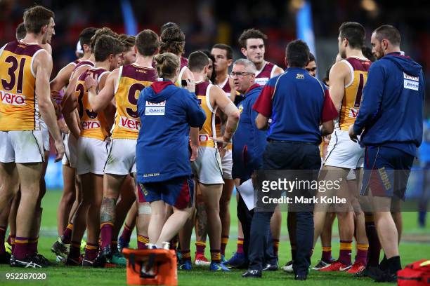 Lions coach Chris Fagan speaks to his team during the round six AFL match between the Greater Western Sydney Giants and the Brisbane Lions at...