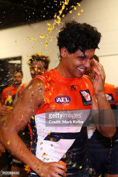 Nick Shipley of the Giants is showered in Gaterade as he celebrates victory with his team after the round six AFL match between the Greater Western...