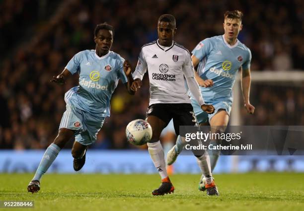 Ryan Sessegnon of Fulham in action with Joel Asoro of Sunderland during the Sky Bet Championship match between Fulham and Sunderland at Craven...