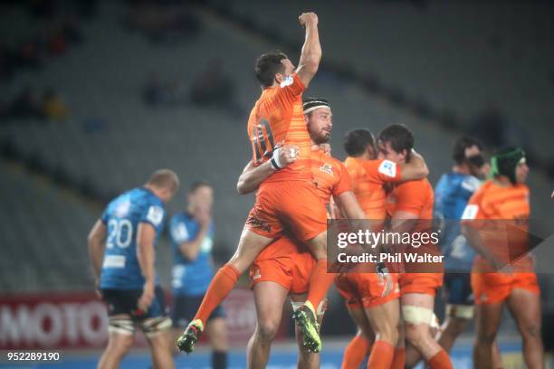 Nicolas Sanchez and Javier Ortega Desio of the Jaguares celebrate on the final whistle during the Super Rugby round 11 match between the Blues and...