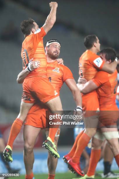 Nicolas Sanchez and Javier Ortega Desio of the Jaguares celebrate on the final whistle during the Super Rugby round 11 match between the Blues and...
