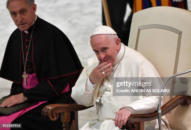 Pope Francis looks towards participants at "Unite To Cure, A Global Health Care Initiative, during his audience at Aula Paolo VI in The Vatican on...