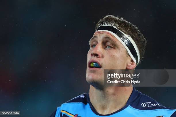 Jarrod Wallace of the Titans looks on during the round eight NRL match between the Gold Coast Titans and Cronulla Sharks at Cbus Super Stadium on...