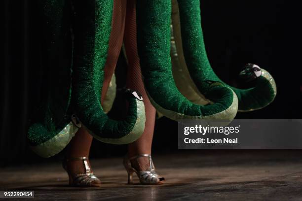 Burlesque dancer Aphrodite DeVine wears a tentacle costume as she performs as Alien Woman during the opening night of the Nerdlesque Festival on...