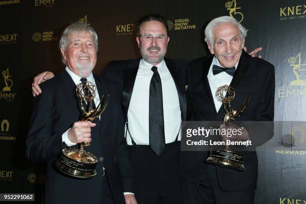 Producers Sid Krofft and Marty Krofft pose with actor David Arquette attends the Press Room during 45th Annual Daytime Creative Arts Emmy Awards at...