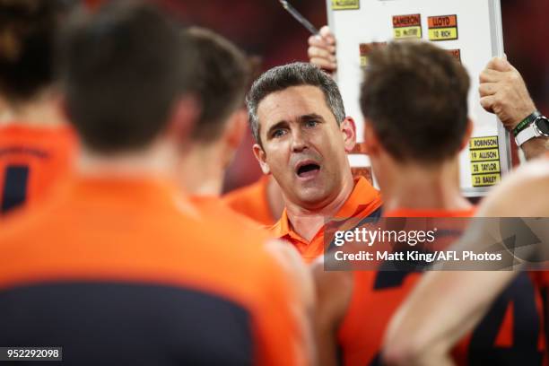 Giants head coach Leon Cameron speaks to players at three quarter time during the round six AFL match between the Greater Western Sydney Giants and...