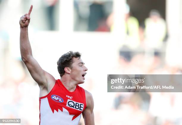 Will Hayward of the Swans celebrate a goal to seal the match during the 2018 AFL round six match between the Geelong Cats and the Sydney Swans at...