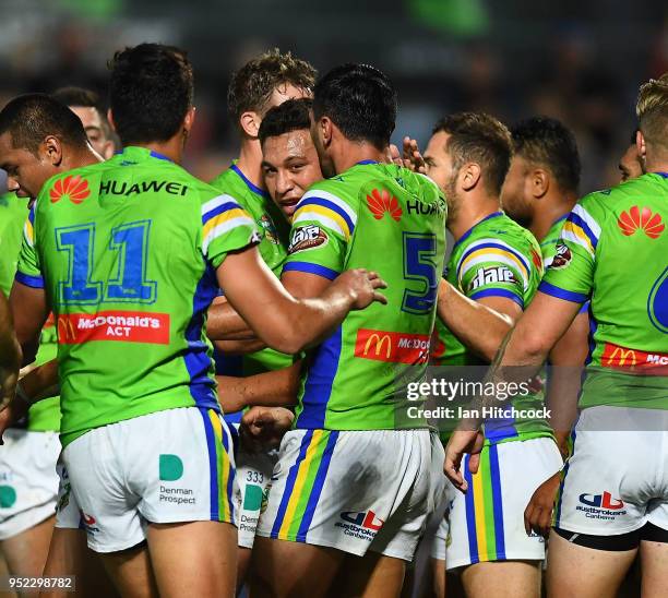 Josh Papalii of the Raiders celebrates after scoring a try during the round eight NRL match between the North Queensland Cowboys and the Canberra...