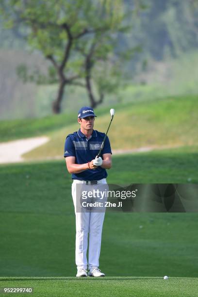 Nacho Elvira of Spain plays a shot during the day three of the 2018 Volvo China Open at Topwin Golf and Country Club on April 28, 2018 in Beijing,...