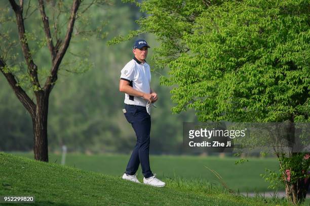 Matt Wallace of England plays a shot during the day three of the 2018 Volvo China Open at Topwin Golf and Country Club on April 28, 2018 in Beijing,...