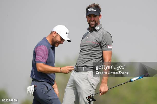 Scott Jamieson of Scotland reacts after the plays a shot during the day three of the 2018 Volvo China Open at Topwin Golf and Country Club on April...