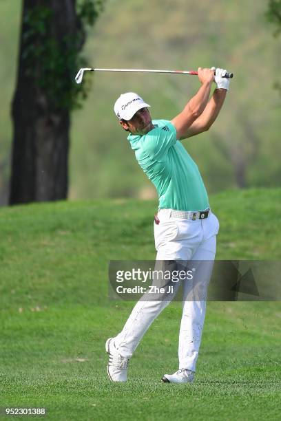 Adrian Otaegui of Spain plays a shot during the day three of the 2018 Volvo China Open at Topwin Golf and Country Club on April 28, 2018 in Beijing,...
