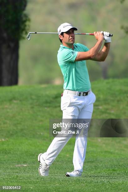 Adrian Otaegui of Spain plays a shot during the day three of the 2018 Volvo China Open at Topwin Golf and Country Club on April 28, 2018 in Beijing,...