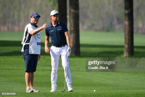 Alexander Bjork of Sweden plays a shot during the day three of the 2018 Volvo China Open at Topwin Golf and Country Club on April 28, 2018 in...