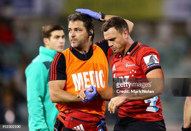 Israel Dagg of the Crusaders is taken from the field during the round 11 Super Rugby match between the Brumbies and the Crusaders at GIO Stadium on...