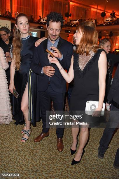 Pheline Roggan, Fahri Yardim and Lavinia Wilson attend the Lola - German Film Award party at Palais am Funkturm on April 27, 2018 in Berlin, Germany.