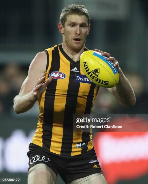 Ben McEvoy of the Hawks controls the ball during the Round six AFL match between the Hawthorn Hawks and the St Kilda Saints at University of Tasmania...